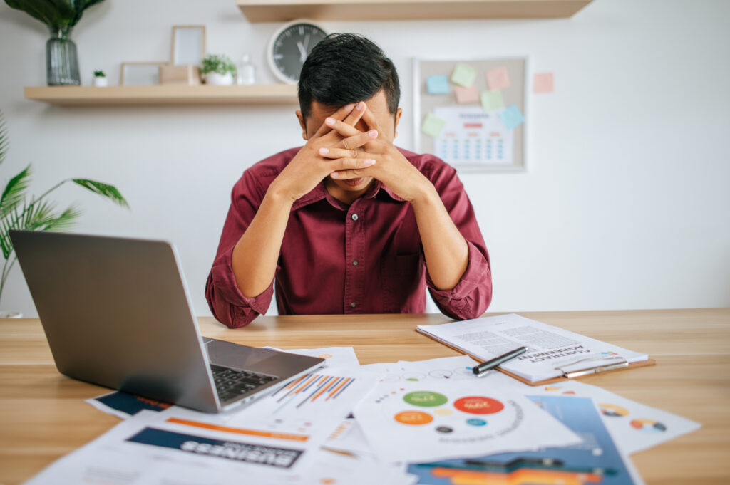 Tech startup team collaborating to avoid startup cost burnout
