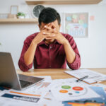 Tech startup team collaborating to avoid startup cost burnout