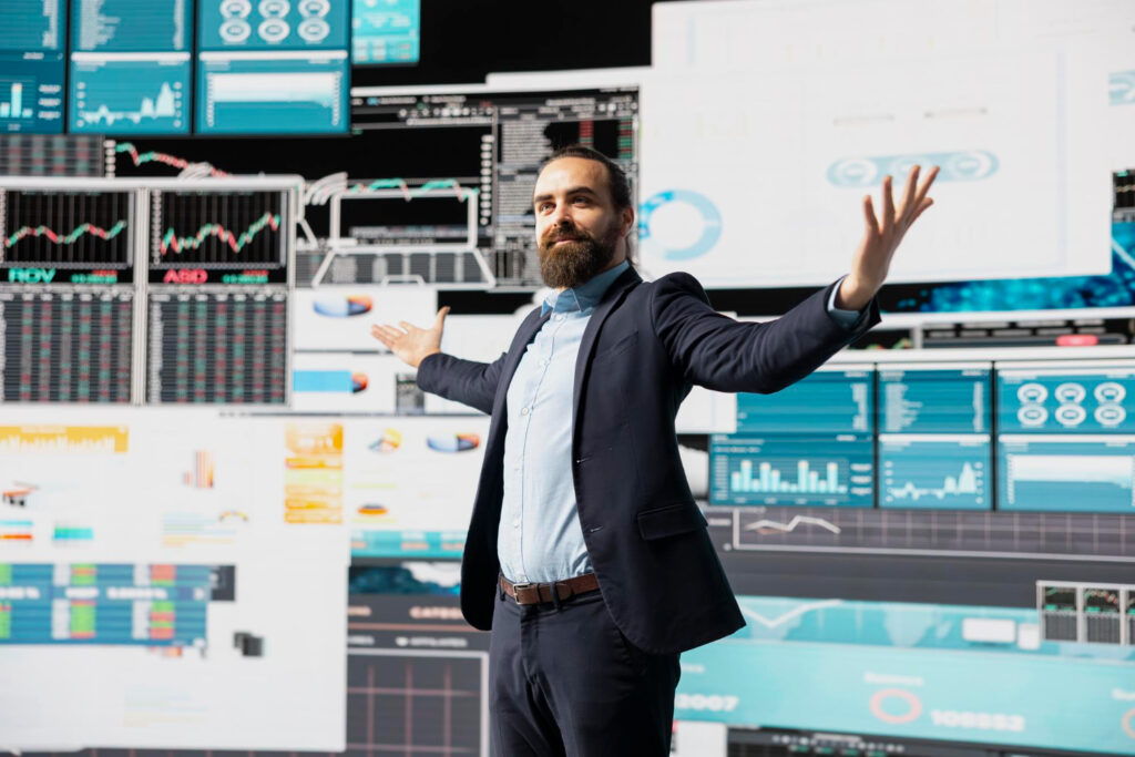 Energy Trading Manager analyzing real-time ETRM solutions data on a digital interface to ensure energy data agility.