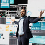 Energy Trading Manager analyzing real-time ETRM solutions data on a digital interface to ensure energy data agility.